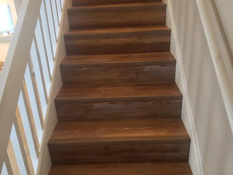 New vinyl flooring stairwell to bedrooms upstairs