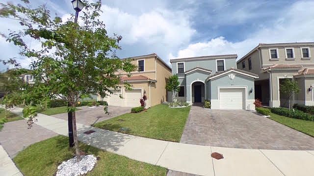 1st image of 894 NE 191st St