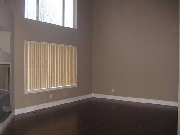 Great Room with High Vault Ceiling & Gas Fireplace