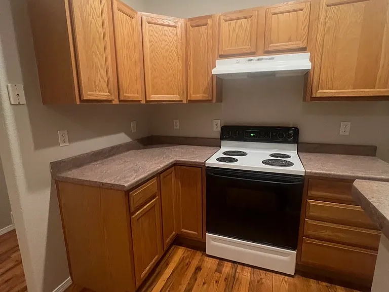 Kitchen with hardwood flooring, actual photo