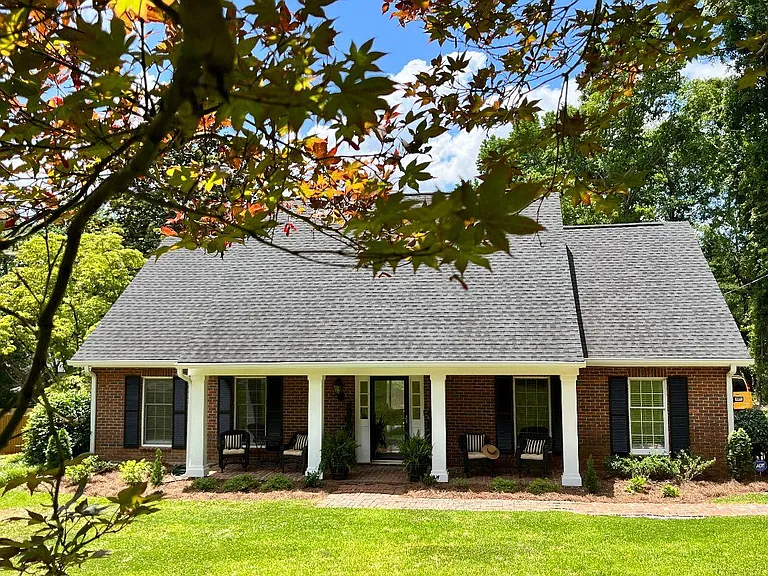Front of House. Regular lawncare, large area for parking and convenient location.