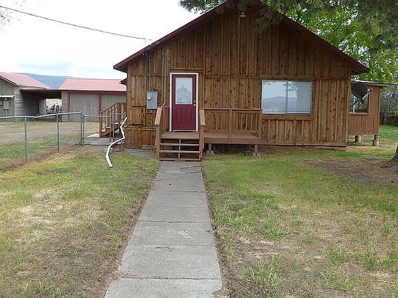 See garages to left of home