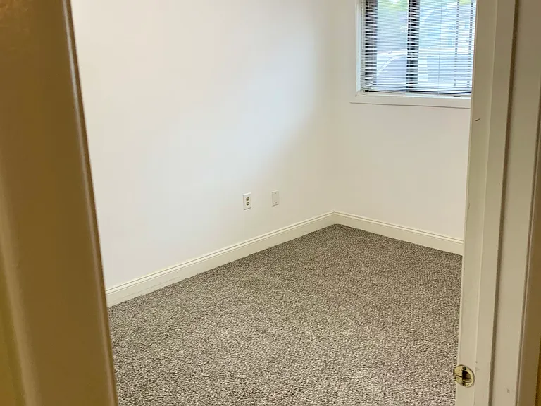 Second bedroom has new carpet and fresh paint.