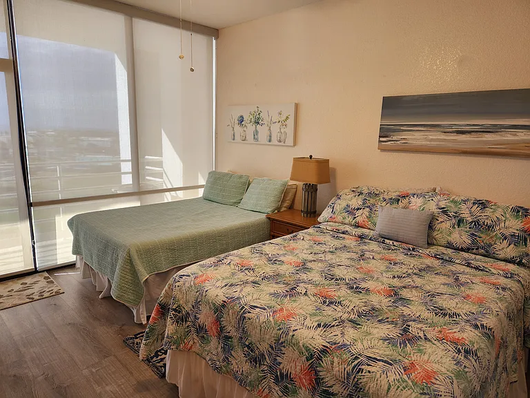 Bedrooms upstairs overlook the bay