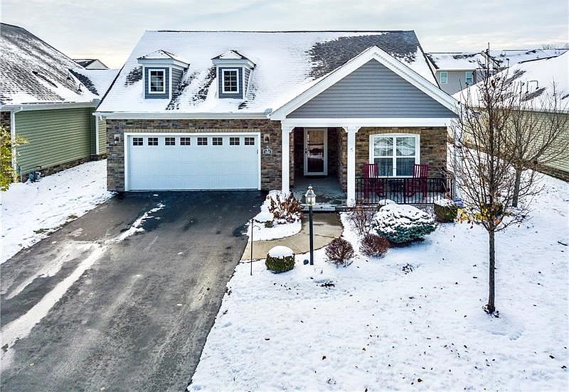 Welcome to 142 Cobblestone Drive... a single family one level living home in Cobblestone Manor, Ohio Township ... award winning 