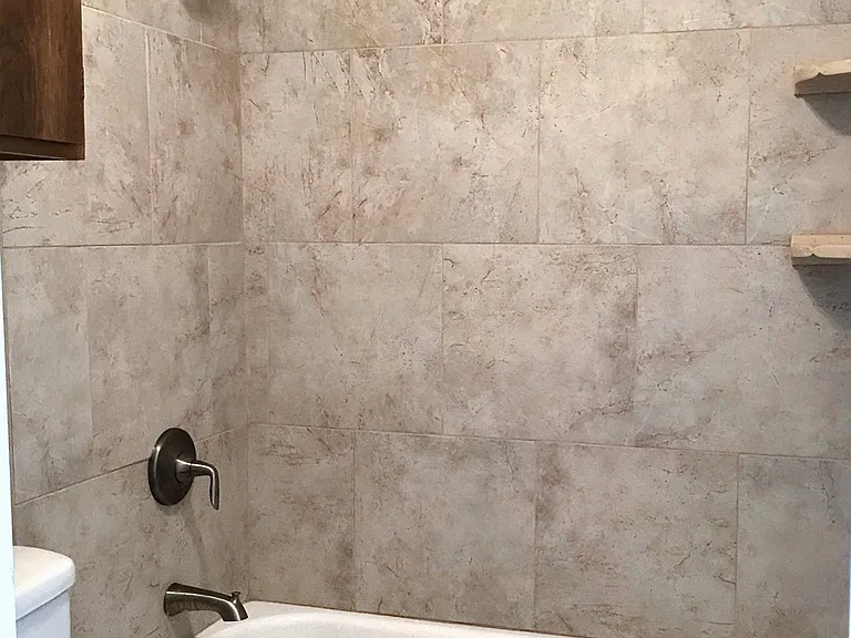 The bathroom is getting a new toilet, vnaities, hardware, and towl racks