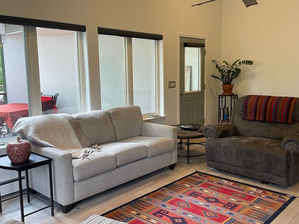 Living room, with door to deck in back