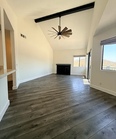 Living room with vaulted ceilings