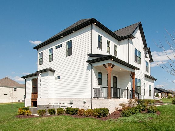 Side Exterior of white home with front and back porches