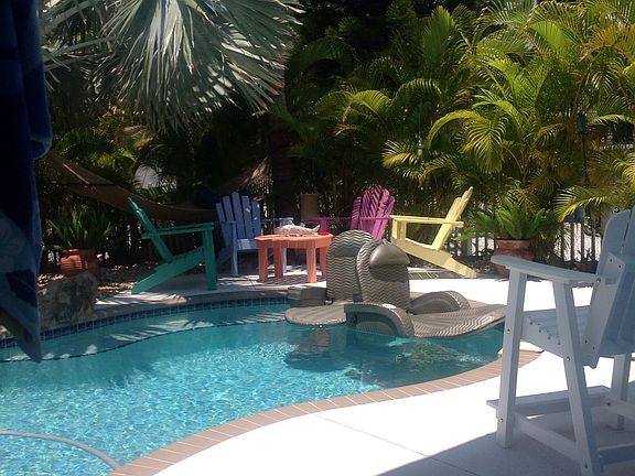 Lush tropical pool setting