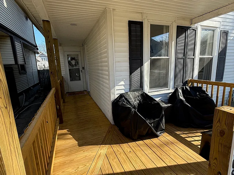 Brand new wrap around front porch with recessed lighting