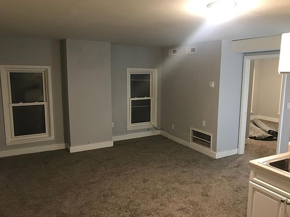 Living room; brand new carpeting throughout.