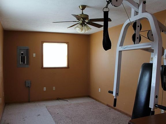 Bonus room off kitchen. Has full bath just off of it.