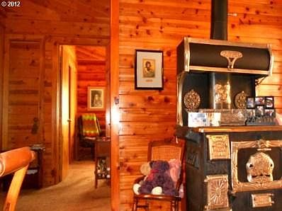 View into secon BR and Antique Stove