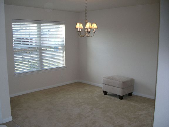 Spacious formal dining room ready to entertain. 