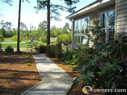 Yard side view toward golf course and 12th green