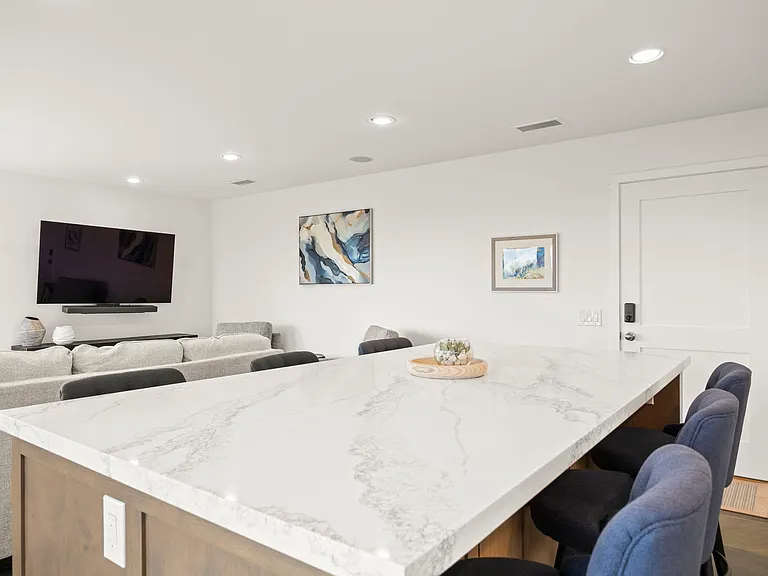 Enjoy the game or your favorite show from the counter or living room.