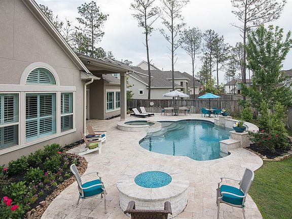 And the backyard oasis has everything your family needs to relax. A sparkling pool with spa and firepit and plenty of deck area to sunbathe, enjoy a m