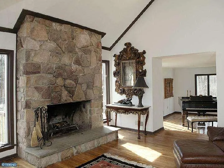 Another shot of the keeping/family room facing the sunken living room with the Steinway Grand piano