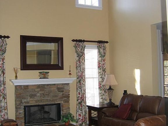 Living Room w/ Stone Fireplace