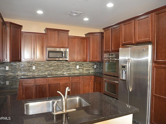 5th image of 9249 W COOLBROOK Avenue