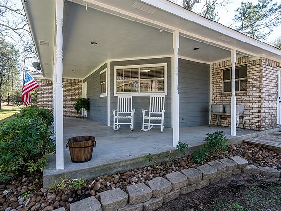 Enjoy your morning coffee on the extensive front porch. Recent exterior paint and exterior doors.