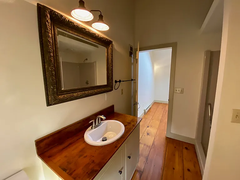 Bathroom has a shower and laundry hookups.