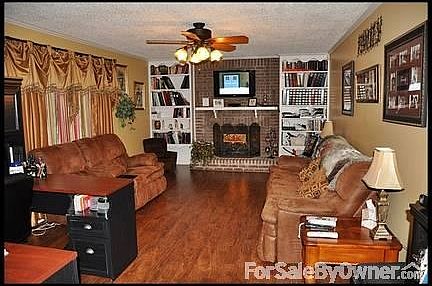 Front Living Room
						:
						Built-in custom bookshelves. Propane gas insert in fireplace.