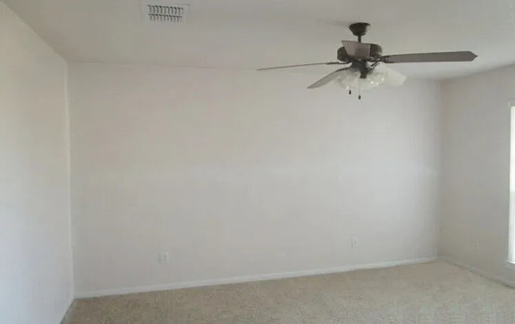 Bedroom #2 with ceiling fan/light.