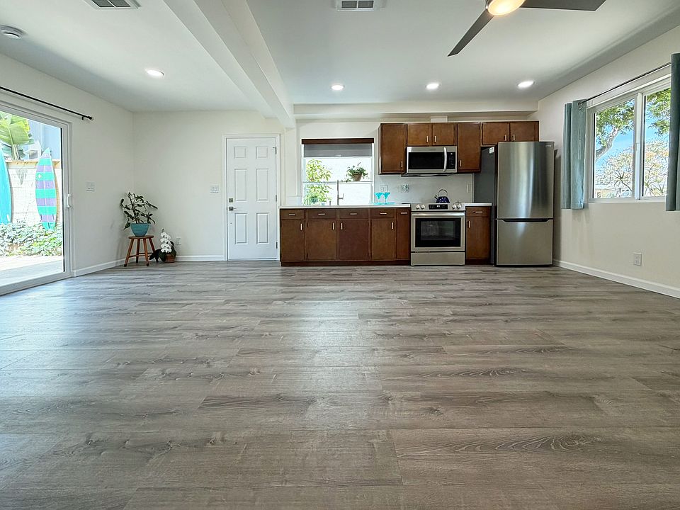 A lovely brand-new studio with a large private patio on the left, a view window to the front and a garden window over the kitchen sink. The bathroom and walk in closet are at our back.