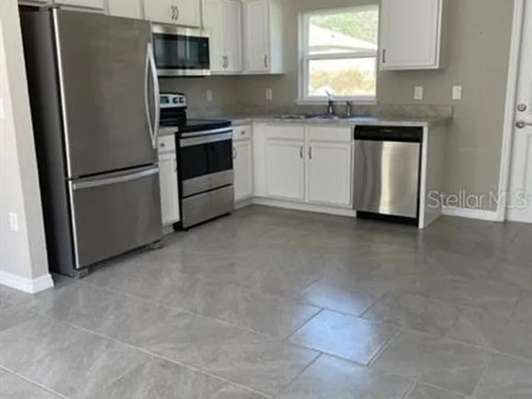 5729 NW 2nd Pl — Photo 2