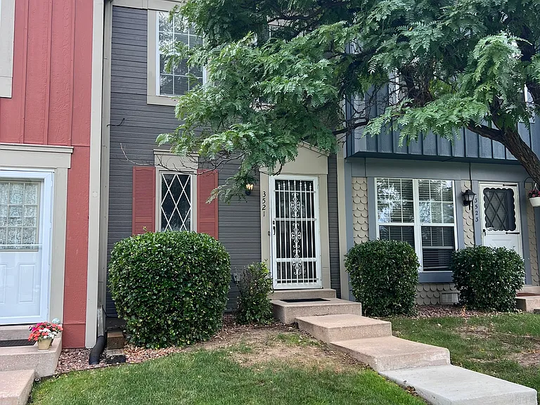 Front entrance to this charming townhome. Large, established tree offers shade and beautiful fall colors.