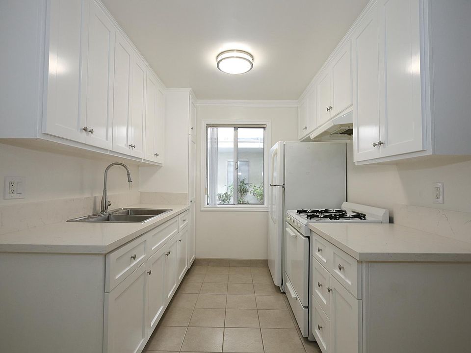 Upgraded kitchen. New cabinets and quartz countertops. New Sink and fixtures. Newer appliances.