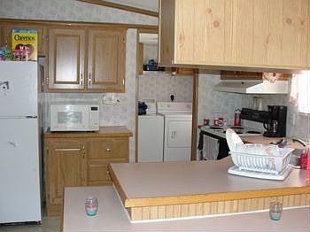 Kitchen w/ Separate Laundry Room