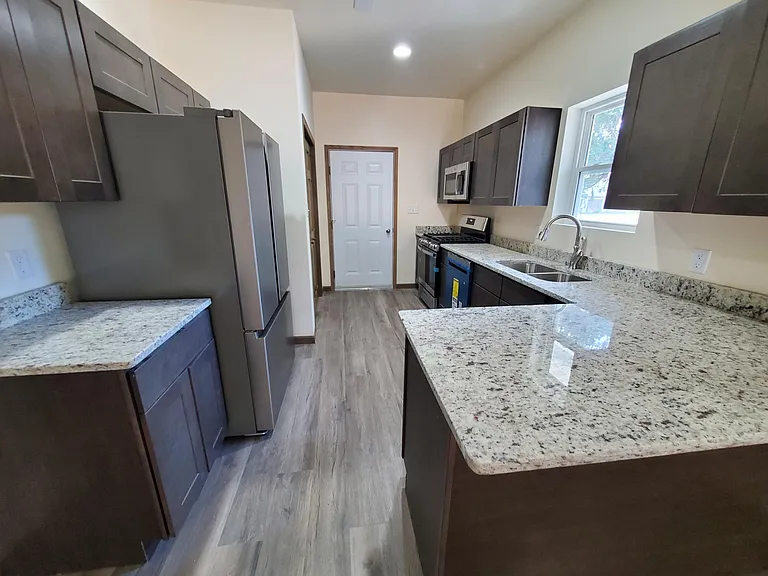 Granite Countertops, Gentle Close Cabinets, Appliances Include: Refrigerator, Stove, Dishwasher & Microwave. Washer and Dryer Hook-ups.