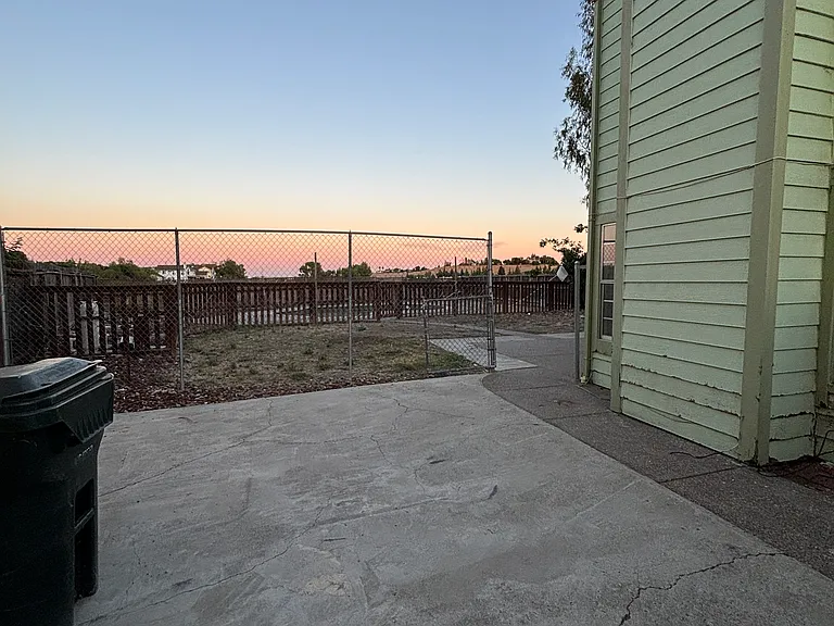 More Backyard area with fence