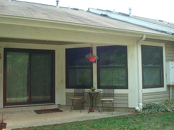 Back patio, perfect for morning coffee looking at the quiet woods.