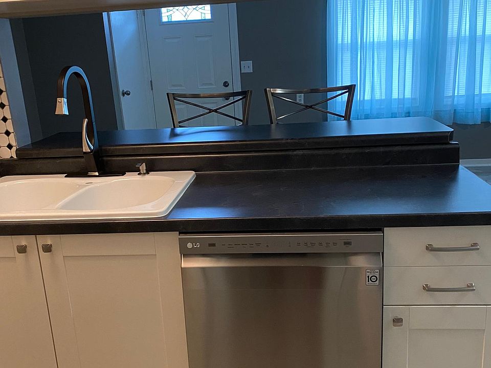 new kitchen cabinets with soft close and new dishwasher.