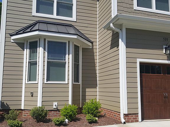 One car garage and bay window
