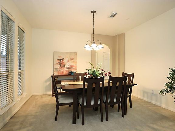 Dining room with entry to the kitchen.