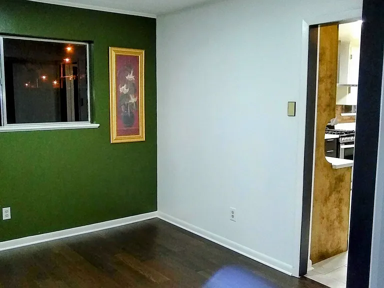 Extra Room or office off of the kitchen. Rear facing window with private view day or night.