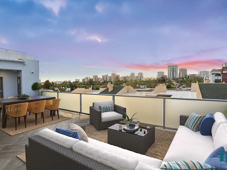 Rooftop Terrace with Entertainment and Seating Area