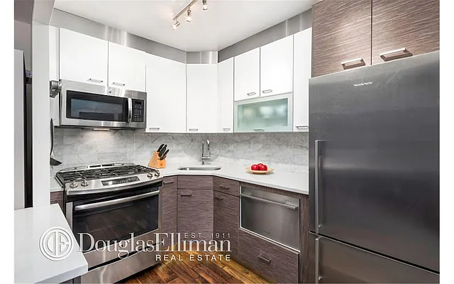 Sold by Douglas Elliman | media 13