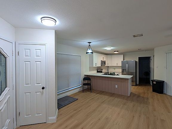 4th image of 7153 Windbrook Ln