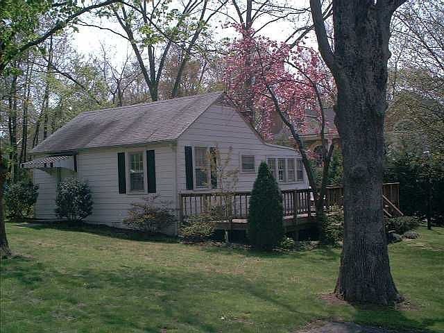 Photo of existing house on property