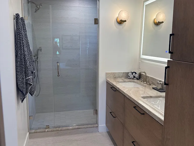 primary bath w/ polished nickel high end fixtures. Walk in shower and separate water closet.