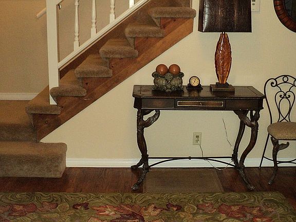 entry has hardwood flooring