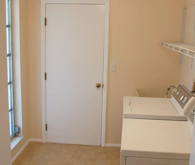 Utility room off garage washer , dryer included