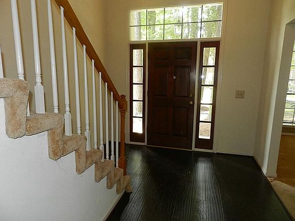 You'll Love the recent Rich Wood Laminate Flooring in Entry & Walkways!