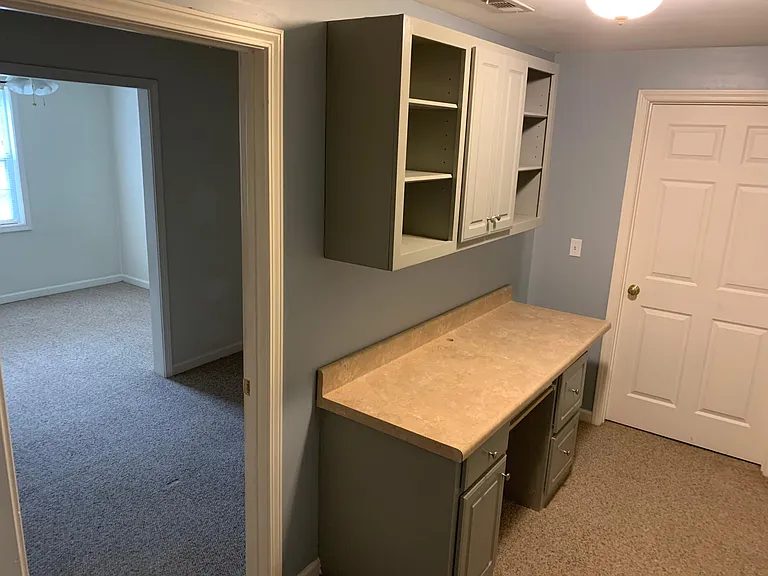 DESK OR OFFICE SPACE WITH SITTING ROOM